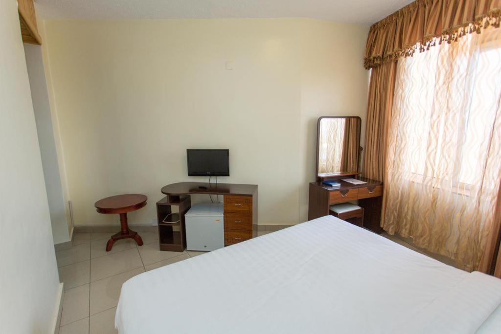 Civitas Hotel Кигали Экстерьер фото